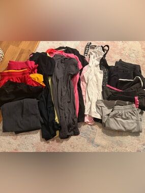 Women’s Size Medium & Large active Wear Shorts & Shirt Bundle -17 pieces total